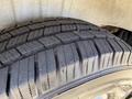 Close-up of a tire belonging to a 2023 Mercedes-Benz Sprinter showing detailed tread patterns and grooves
