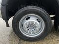 Close-up of a silver wheel with a Continental tire on a 2021 Ford F-550