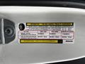 A tire information label from a 2011 Dodge Grand Caravan detailing tire size pressure and loading capacity