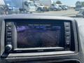 Display screen of a 2020 Dodge Grand Caravan showing a rearview camera view with guidance lines