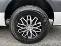 A close-up of a 2019 Mercedes-Benz Sprinter's alloy wheel featuring a silver multi-spoke design and a black tire with visible tread pattern