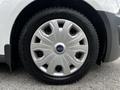 A close-up view of a silver wheel rim with a circular design featuring eight spokes, mounted on a black tire branded with the word "Blazer"