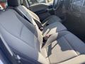 Interior view of a 2017 Ford F-150 with gray fabric seats showing the front seating area and dashboard