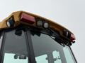 2011 John Deere 310SJ 4x4 Wheel Loader Extended Hoe 4 in 1 with lights and warning signals on top of the cab