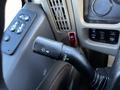 Interior view of a 2013 International DuraStar 4300 showing a control lever for wipers with markings for different speed settings