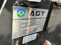A metal identification plate for a 2024 AGT Industrial Yellow H13R Mini Excavator displaying logo type and specifications