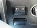 Interior controls of a 2017 Mercedes-Benz Sprinter including buttons for various functions on a black dashboard