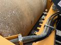A 2020 Hyundai HR110C compactor featuring a large cylindrical roller and hydraulic hoses connected to a bright yellow frame