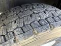 Close-up of a worn tire showcasing deep tread patterns and visible wear on a 1994 Volvo FE 42 vehicle