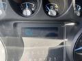 Dashboard display of a 2016 Ford F-250 SD showing engine hours with several gauges in the background