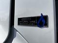 A badge on a 2012 Freightliner M2 112 displaying the text Natural Gas Technology with a blue flame logo