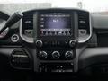 The interior dashboard of a 2020 RAM 3500 featuring a large touchscreen display with radio controls and climate settings