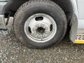 Close-up of a wheel and tire from a 2017 Chevrolet Express showing the rim and tread pattern