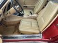 Interior of a 1970 Chevrolet Corvette featuring beige bucket seats with subtle stitching and a minimalist dashboard design