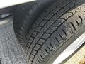 Close-up of a 2019 Ford Econoline tire showing tread patterns and rubber texture