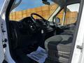 Interior view of a 2017 RAM Promaster showing the driver's seat steering wheel dashboard and floor mat