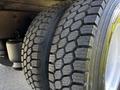 Close-up of a tire on a 2016 Freightliner M2 106 showcasing detailed tread pattern and a sturdy sidewall