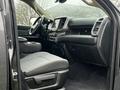 Interior view of a 2020 RAM 3500 showcasing the front seats dashboard and center console with a touchscreen display