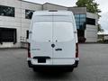 A 2019 Mercedes-Benz Sprinter van viewed from the rear with a white exterior and the model name "Sprinter" displayed on the back