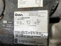 A 2000 Ford Motorhome engine label displaying important information about power generation and specifications for the Cummins generator