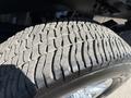 Close-up of a 2017 Ford F-350 SD tire showing tread pattern and rubber texture