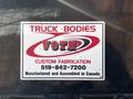 2021 Ford F-550 truck with a company logo for VOTH custom fabrication and contact information