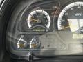 Dashboard of a 2012 Autocar Xpert showing various gauges including speedometer tachometer and indicators for DEF and oil pressure