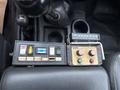Controls and switches for a 2011 Dodge Ram 5500 featuring buttons for power spinner and feed rate settings