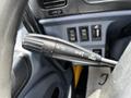 A steering column control lever for a 2006 Hino 268 featuring functions for turn signals and headlights