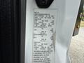 2017 Ford F-750 truck with specifications label showing weight capacity tire pressure and other details