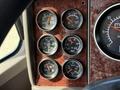 A dashboard of a 2009 Kenworth T270 showing various gauges for volts water temperature oil pressure fuel and brake levels