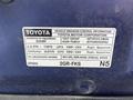 2022 Toyota Tacoma vehicle emission control information label featuring details about the vehicle's compliance and specifications