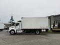 A 2017 Kenworth T370 box truck in profile view with a white exterior and silver accents