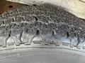 Close-up of a tire tread from a 2008 Ford Econoline showing deep grooves and textured surface for traction