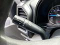 Close-up of a windshield wiper control stalk with various settings for the 2020 Ford F-350 Super Duty