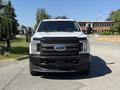 A white 2017 Ford F-350 SD truck facing forward with a black grille and headlights visible