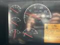 Dashboard of a 2005 Volvo VND 122 displaying gauges for fuel temperature oil pressure and engine RPM with a digital odometer reading 761 km