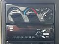 Dashboard controls of a 2017 International WorkStar 7600 showing climate control knobs and a radio display with FM settings