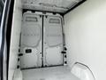 Interior view of a 2012 Mercedes-Benz Sprinter showing empty cargo space with two rear doors open