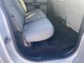 Interior view of the back seat of a 2017 Ford F-150 featuring gray fabric upholstery and floor mats