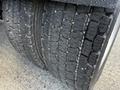 Close-up of the dual rear tires of a 2009 Ford LCF 550 showing tread patterns and surface details