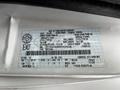 A 2009 Ford Econoline vehicle identification number sticker displaying various specifications and details about the vehicle's weight and tire information