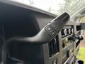Close-up of the gear shift lever on a 2020 Chevrolet Express showcasing the control for adjusting vehicle speed