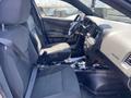 Interior of a 2019 Dodge Charger showing front seats and dashboard with controls and a steering wheel