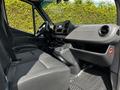 Interior view of a 2020 Mercedes-Benz Sprinter showcasing the driver's seat dashboard and controls