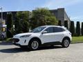 A white 2020 Ford Escape parked with sleek design features and alloy wheels