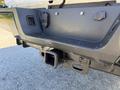 Close-up of the rear hitch receiver on a 2017 Ford F-350 SD showing the connection points and mounting brackets