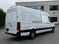 A 2019 Mercedes-Benz Sprinter van in white with a high roof and rear cargo doors