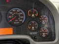 Dashboard of a 2013 International Durastar 4300 displaying speedometer fuel gauge and various warning lights