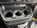 A black plastic cup holder unit with three circular openings designed for beverage containers in a 2017 Chevrolet Express